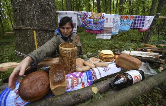 Mari native religion followers hold prayer service in sacred grove