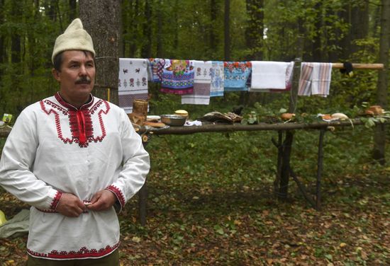 Mari native religion followers hold prayer service in sacred grove