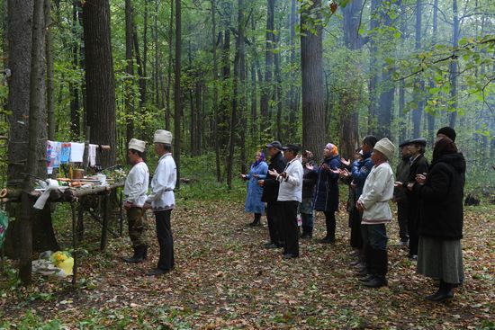 Mari native religion followers hold prayer service in sacred grove