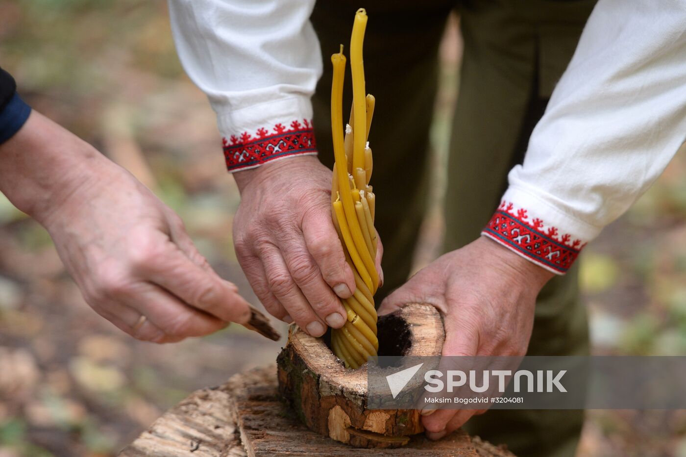 Mari native religion followers hold prayer service in sacred grove
