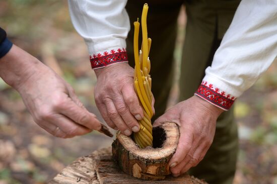 Mari native religion followers hold prayer service in sacred grove