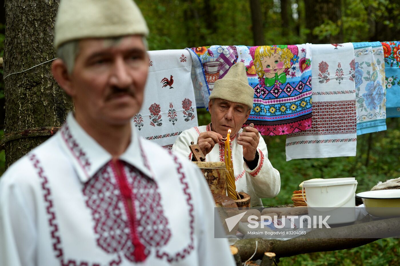 Mari native religion followers hold prayer service in sacred grove