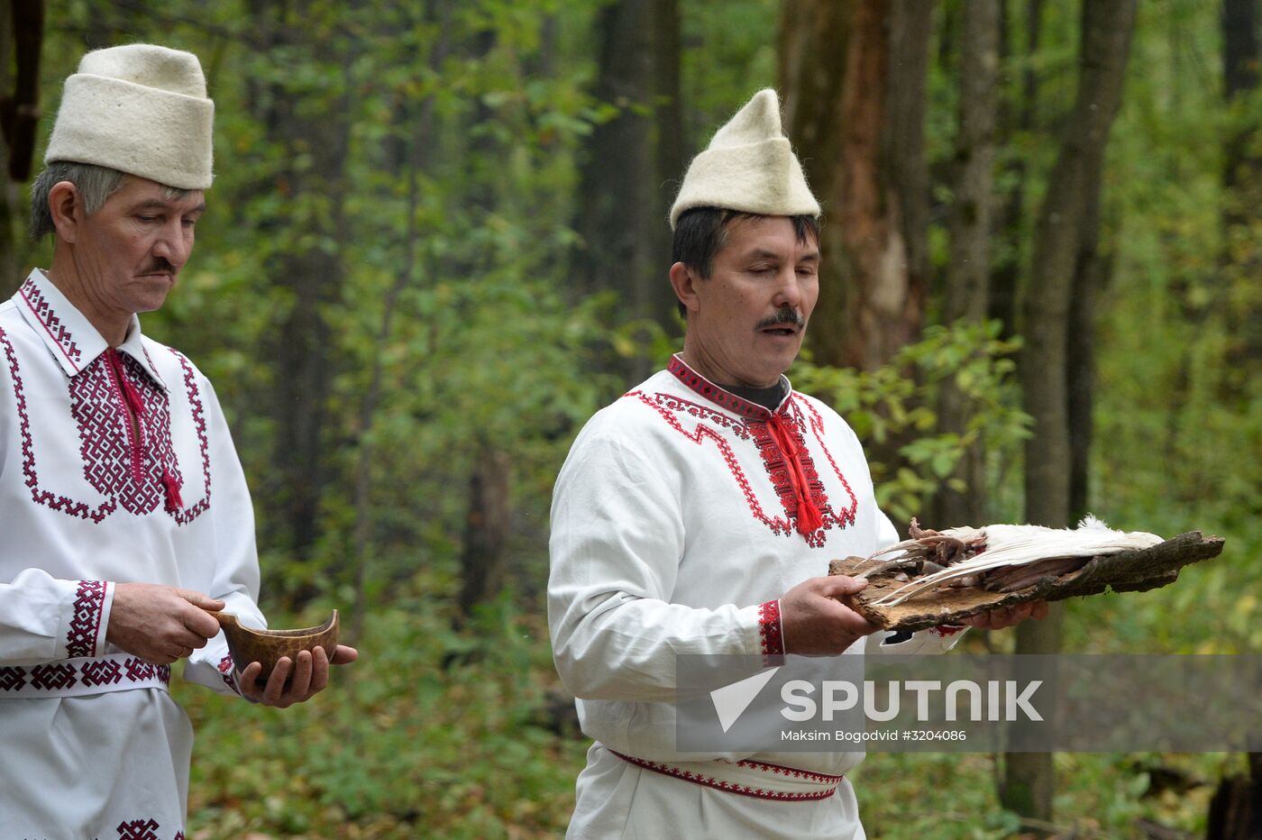 Mari native religion followers hold prayer service in sacred grove