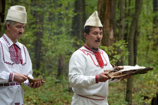 Mari native religion followers hold prayer service in sacred grove
