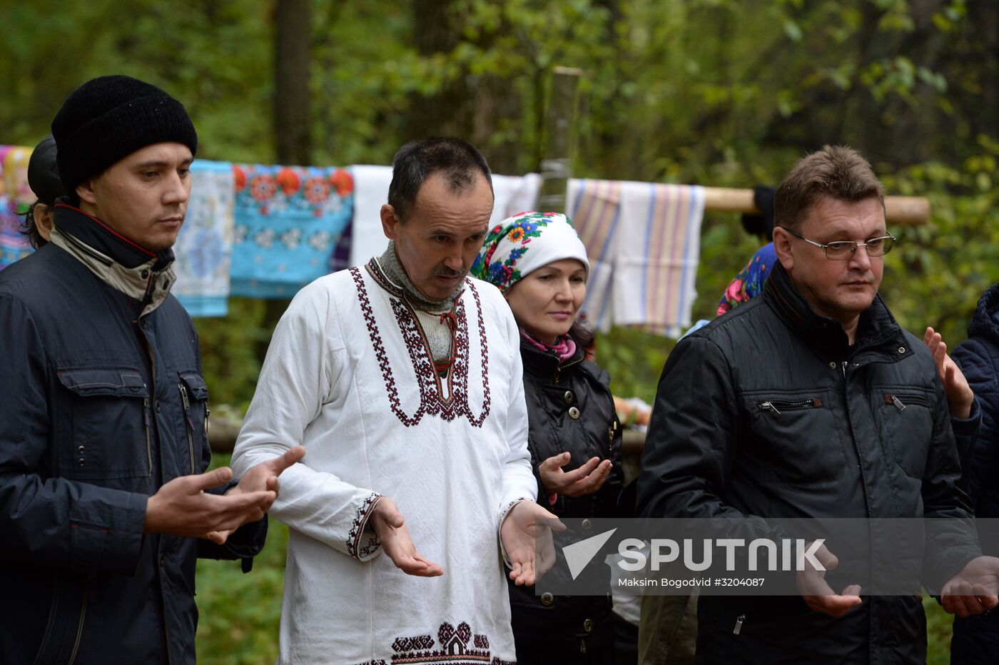 Mari native religion followers hold prayer service in sacred grove