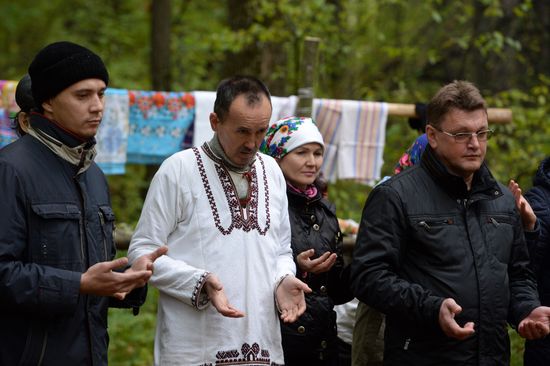 Mari native religion followers hold prayer service in sacred grove