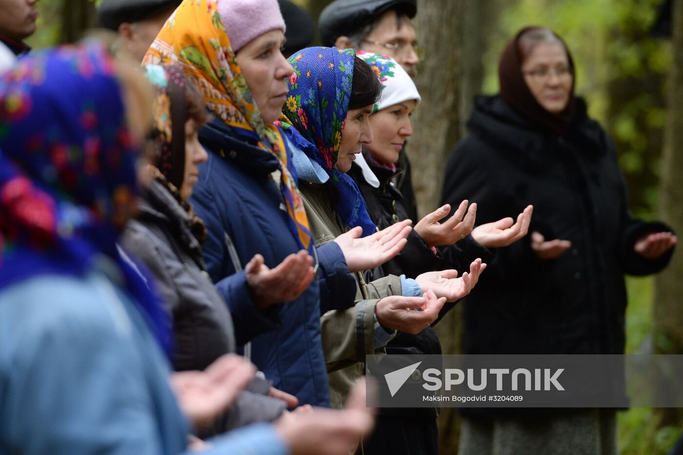 Mari native religion followers hold prayer service in sacred grove