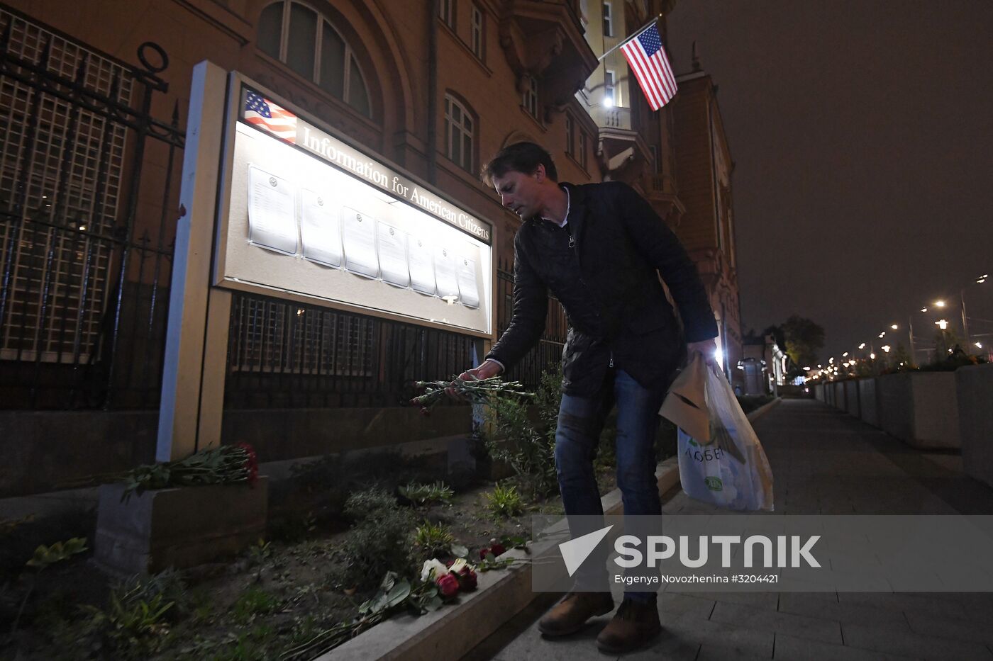 Flowers by US Embassy in Moscow in memory of dead in Las Vegas