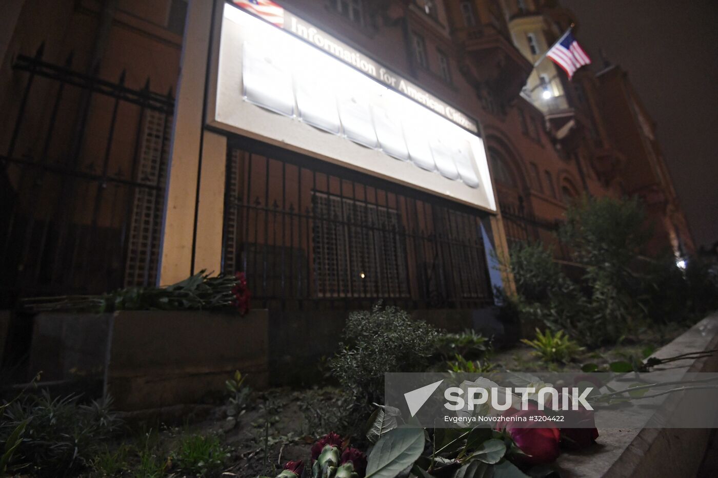 Flowers by US Embassy in Moscow in memory of dead in Las Vegas