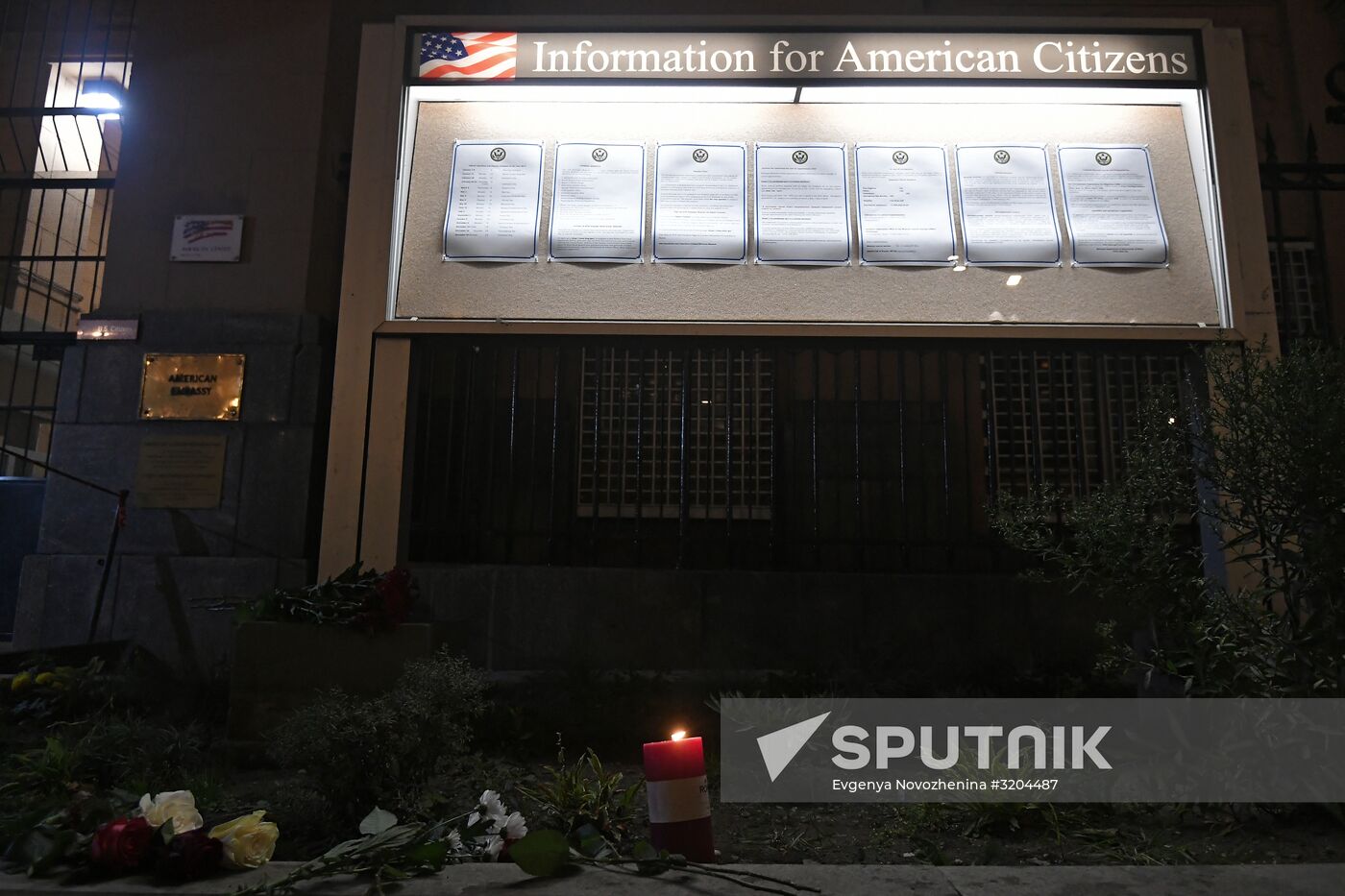 Flowers by US Embassy in Moscow in memory of dead in Las Vegas