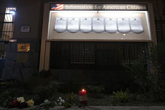 Flowers by US Embassy in Moscow in memory of dead in Las Vegas