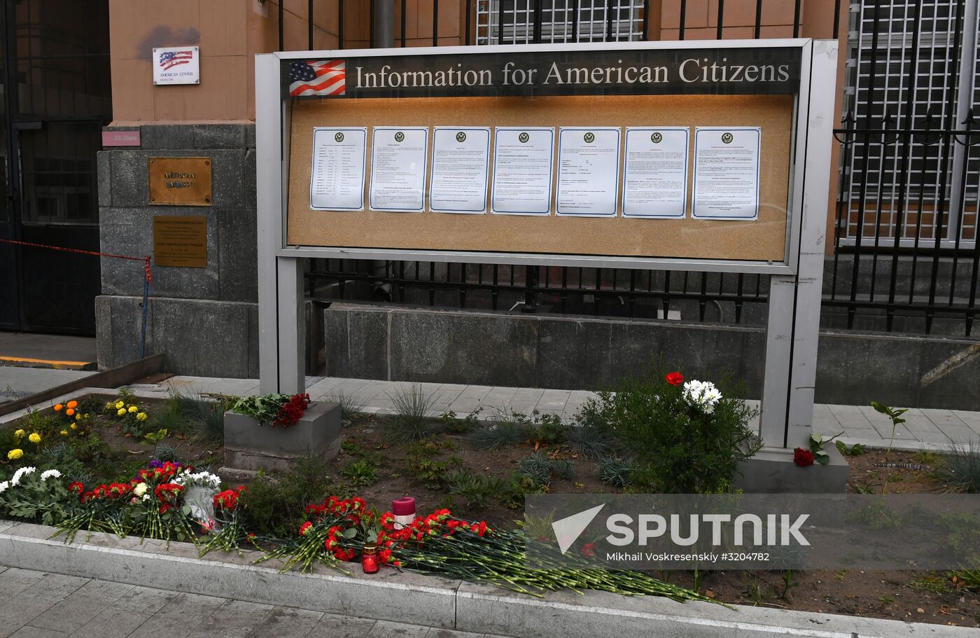 Flowers by US Embassy in Moscow in memory of dead in Las Vegas