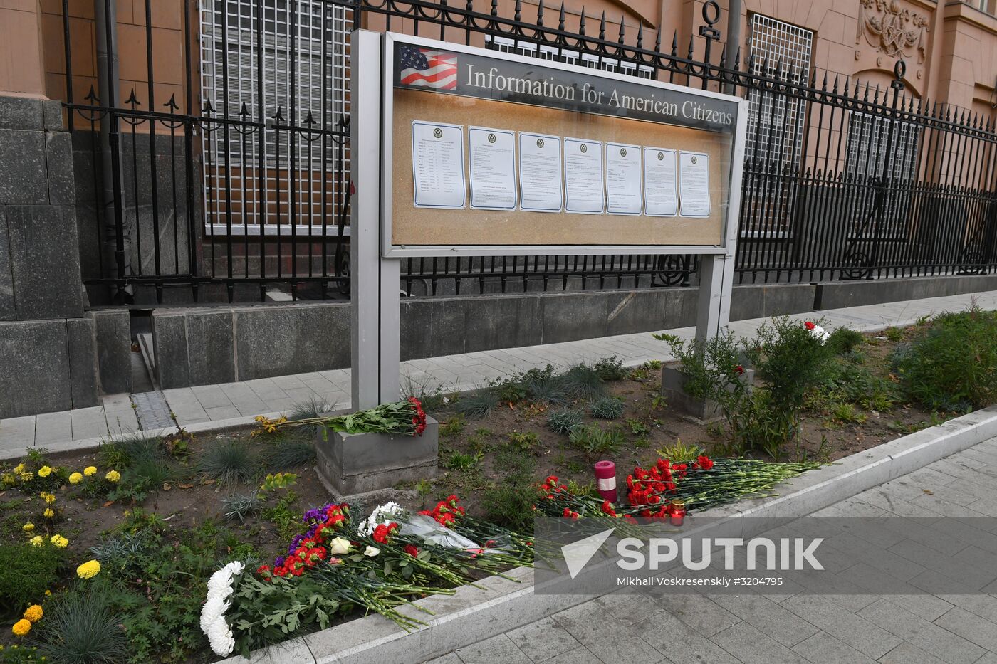 Flowers by US Embassy in Moscow in memory of dead in Las Vegas
