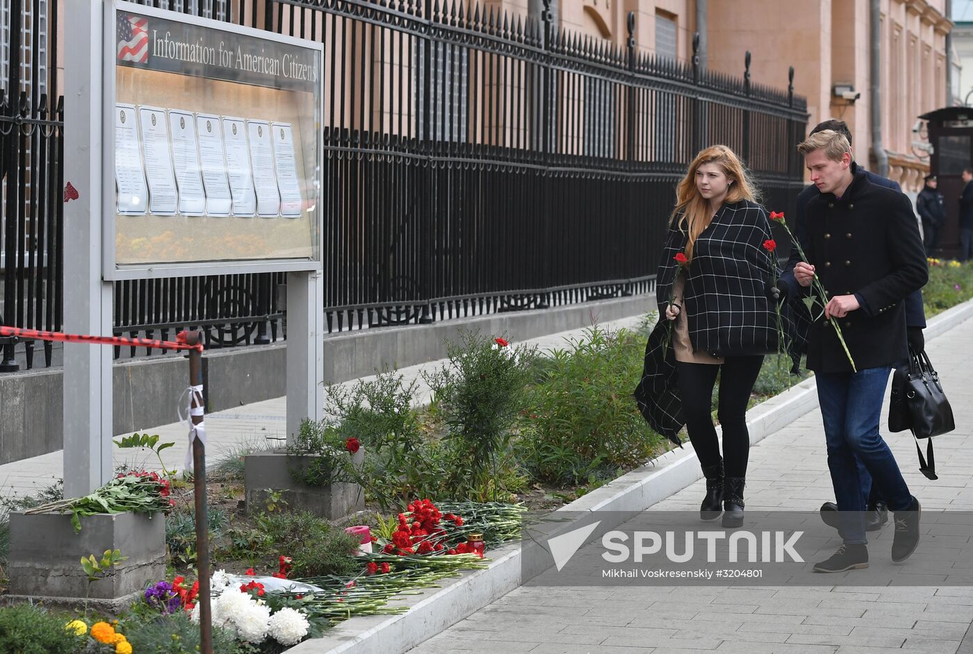 Flowers by US Embassy in Moscow in memory of dead in Las Vegas