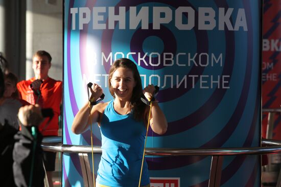 Tina Kandelaki holds fitness training in Moscow metro