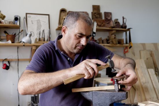 Making jewelry at workshop in Tskhinval