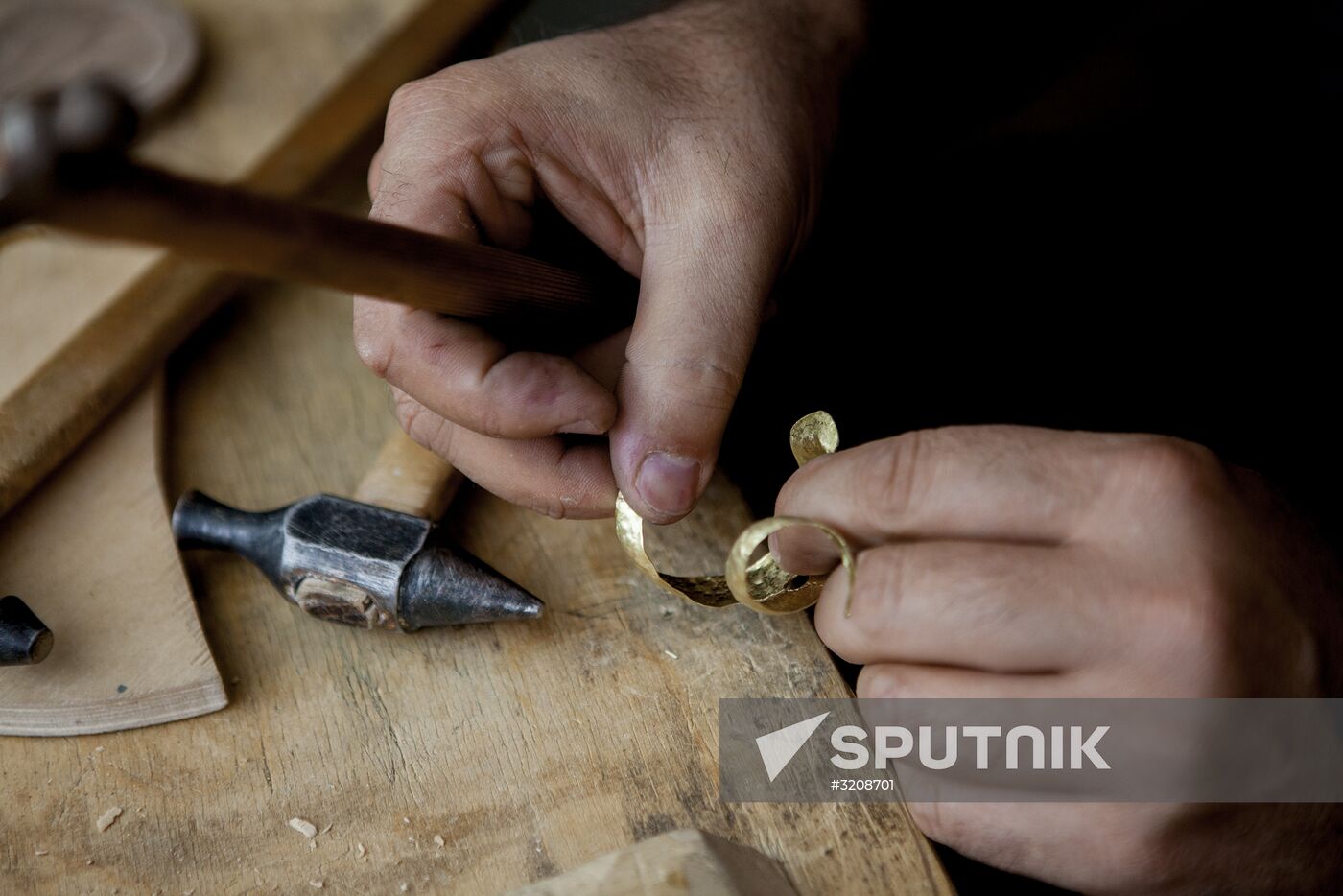 Making jewelry at workshop in Tskhinval