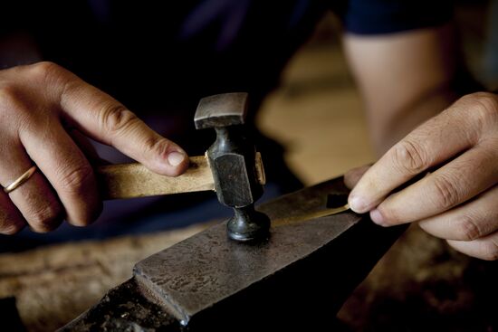 Making jewelry at workshop in Tskhinval