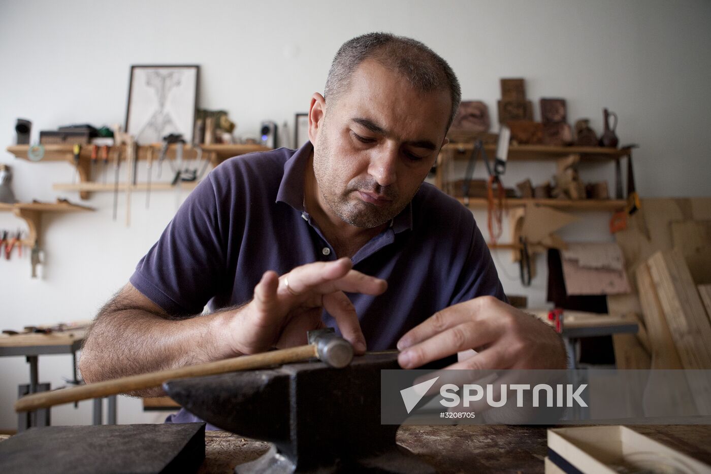 Making jewelry at workshop in Tskhinval