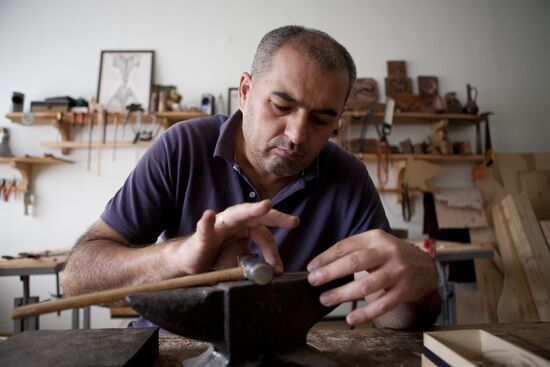 Making jewelry at workshop in Tskhinval