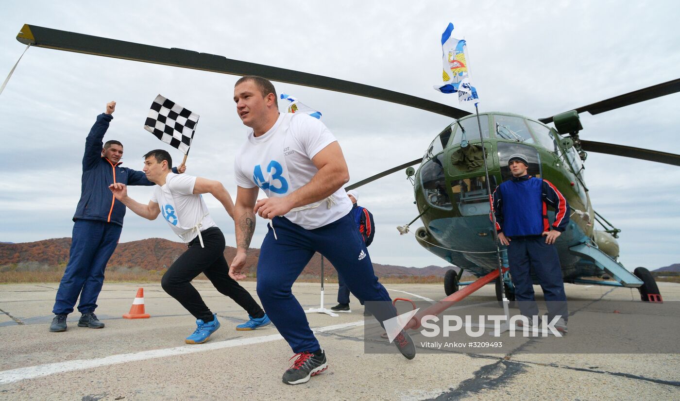 Servicemen take physical fitness test at Pacific Fleet air base