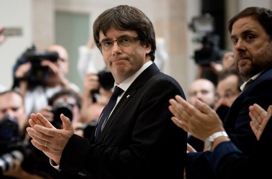 Catalonia's leader calls for suspending declaration of independence