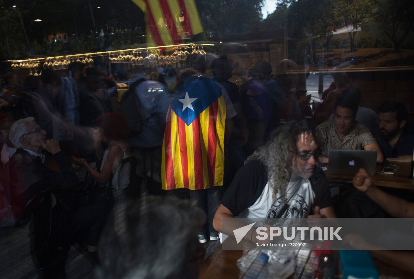 Catalonia's leader calls for suspending declaration of independence