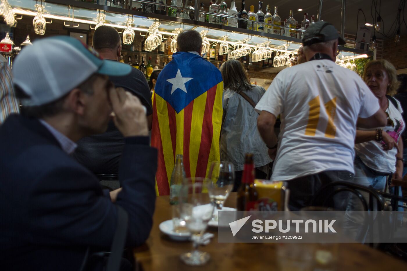 Catalonia's leader calls for suspending declaration of independence