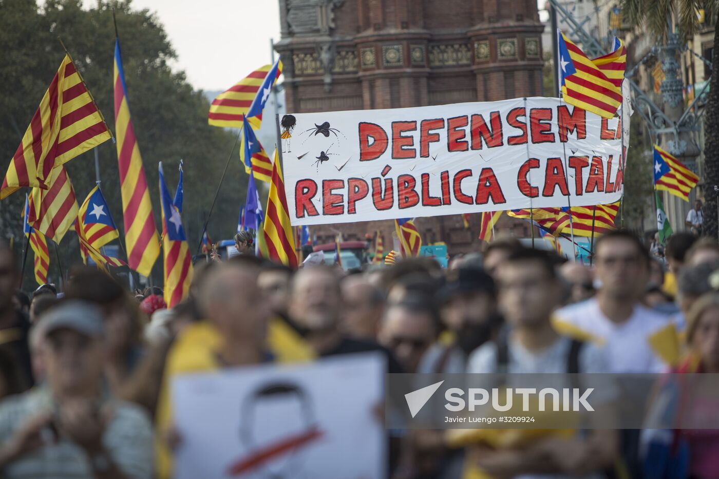 Catalonia's leader calls for suspending declaration of independence