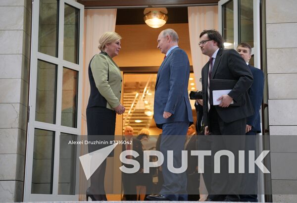 Russian President Vladimir Putin meets with President of Croatia Kolinda Grabar-Kitarovic