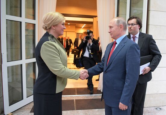 Russian President Vladimir Putin meets with President of Croatia Kolinda Grabar-Kitarovic