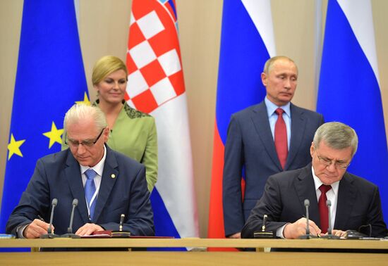 Russian President Vladimir Putin meets with President of Croatia Kolinda Grabar-Kitarovic