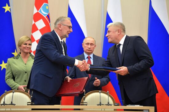 Russian President Vladimir Putin meets with President of Croatia Kolinda Grabar-Kitarovic