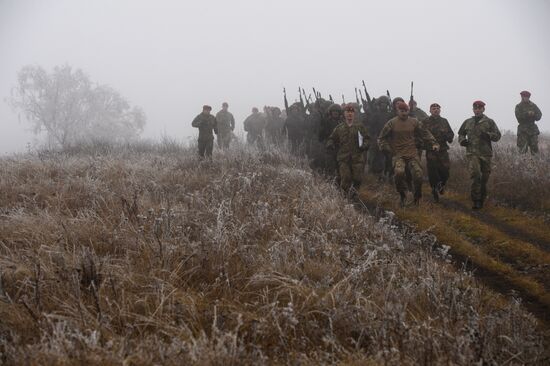 Test for right to wear crimson and green beret