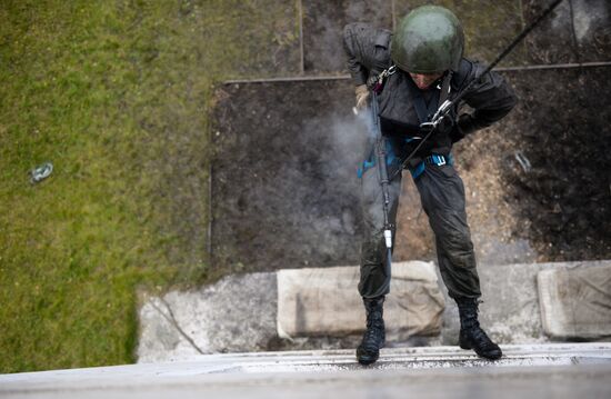 Test for right to wear crimson and green beret