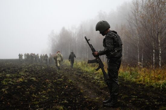 Test for right to wear crimson and green beret