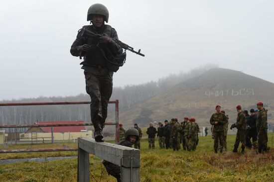 Test for right to wear crimson and green beret