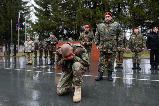 Test for right to wear crimson and green beret