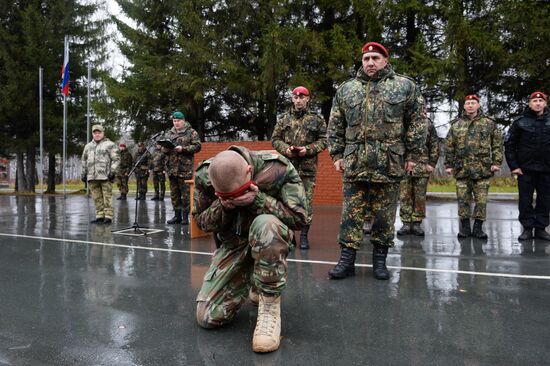 Test for right to wear crimson and green beret