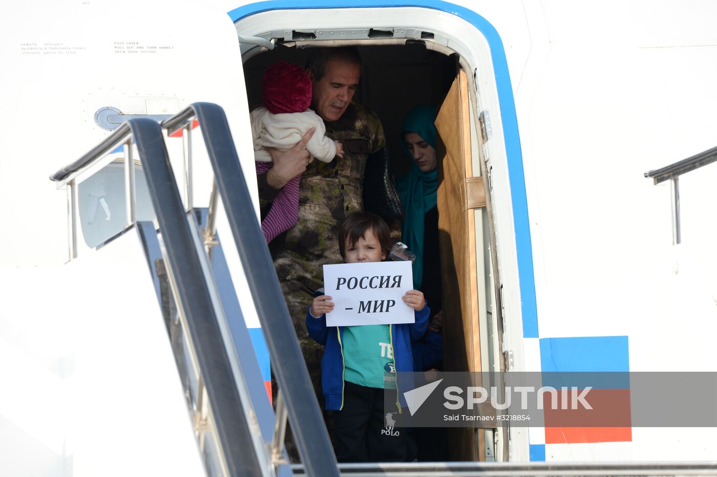 Russian children rescued in Syria are met at Grozny airport