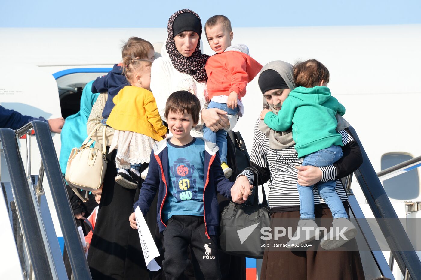 Russian children rescued in Syria are met at Grozny airport