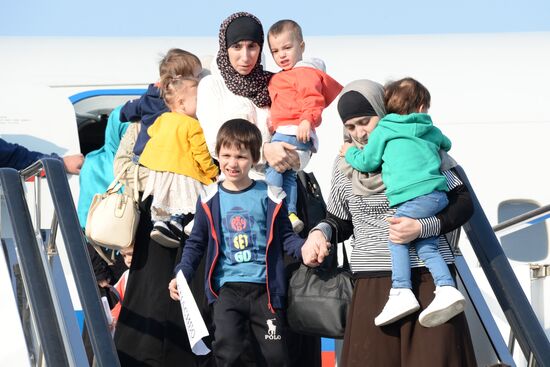 Russian children rescued in Syria are met at Grozny airport
