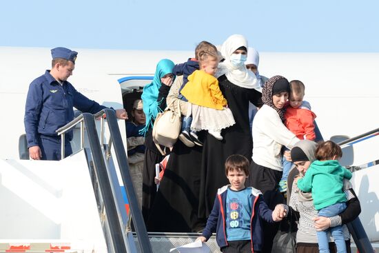 Russian children rescued in Syria are met at Grozny airport