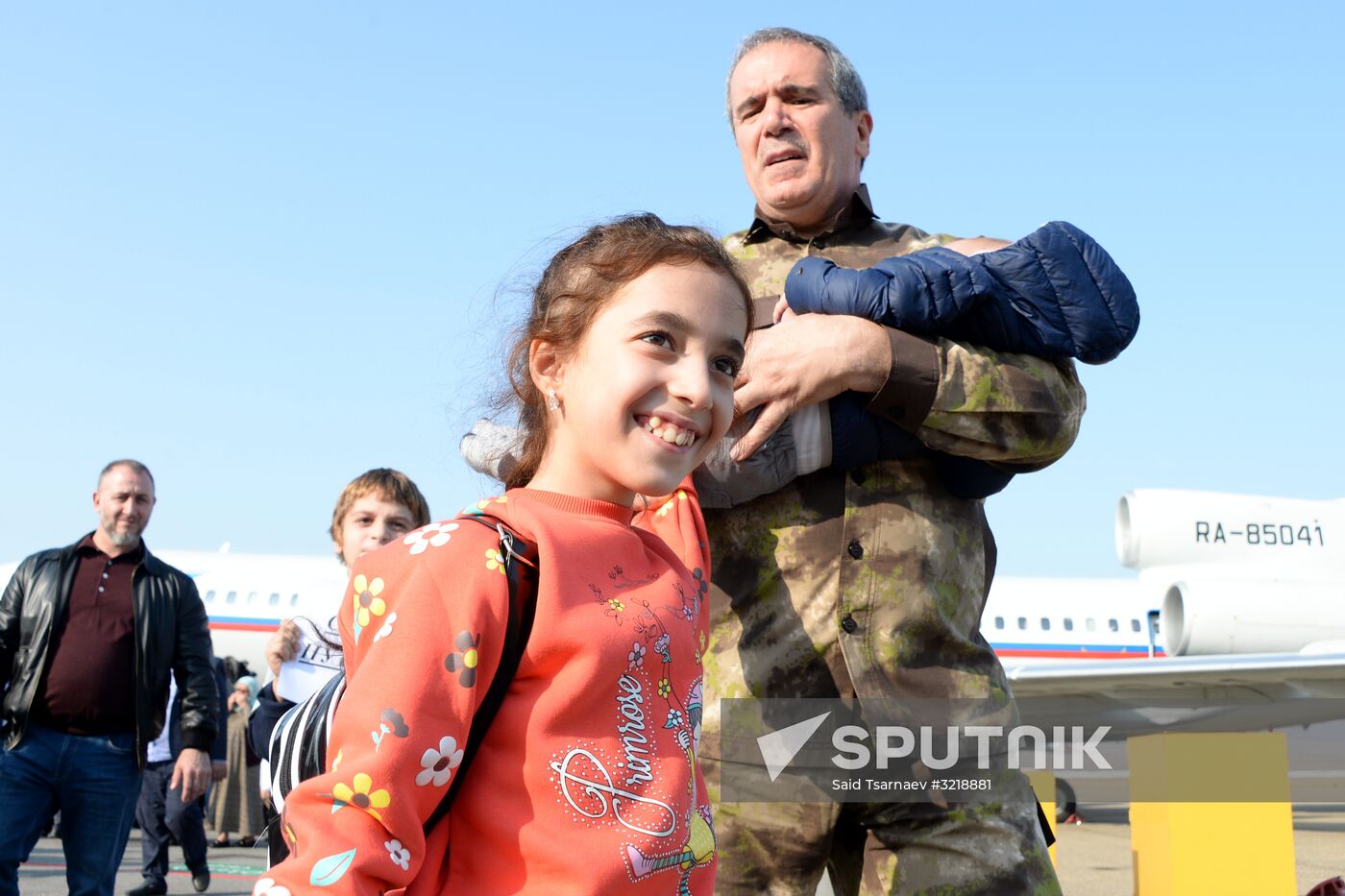 Russian children rescued in Syria are met at Grozny airport