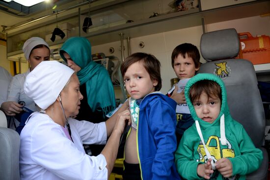 Russian children rescued in Syria are met at Grozny airport