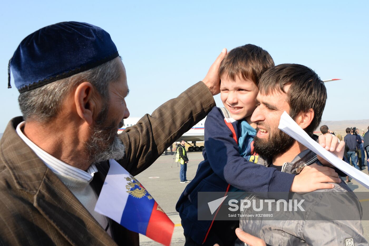 Russian children rescued in Syria are met at Grozny airport