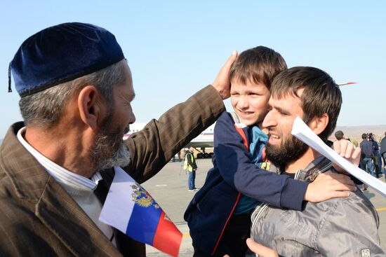 Russian children rescued in Syria are met at Grozny airport