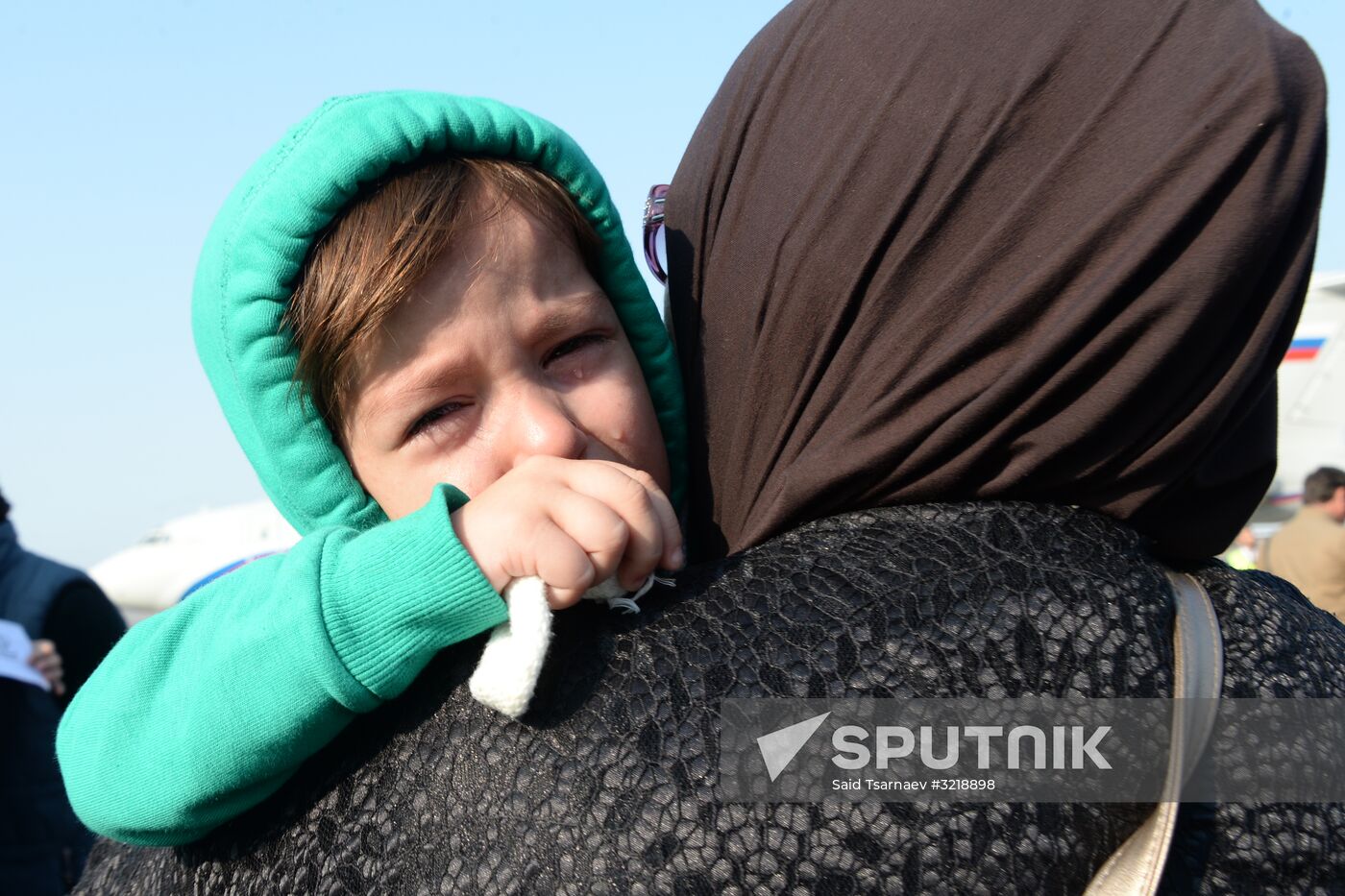 Russian children rescued in Syria are met at Grozny airport