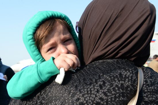 Russian children rescued in Syria are met at Grozny airport