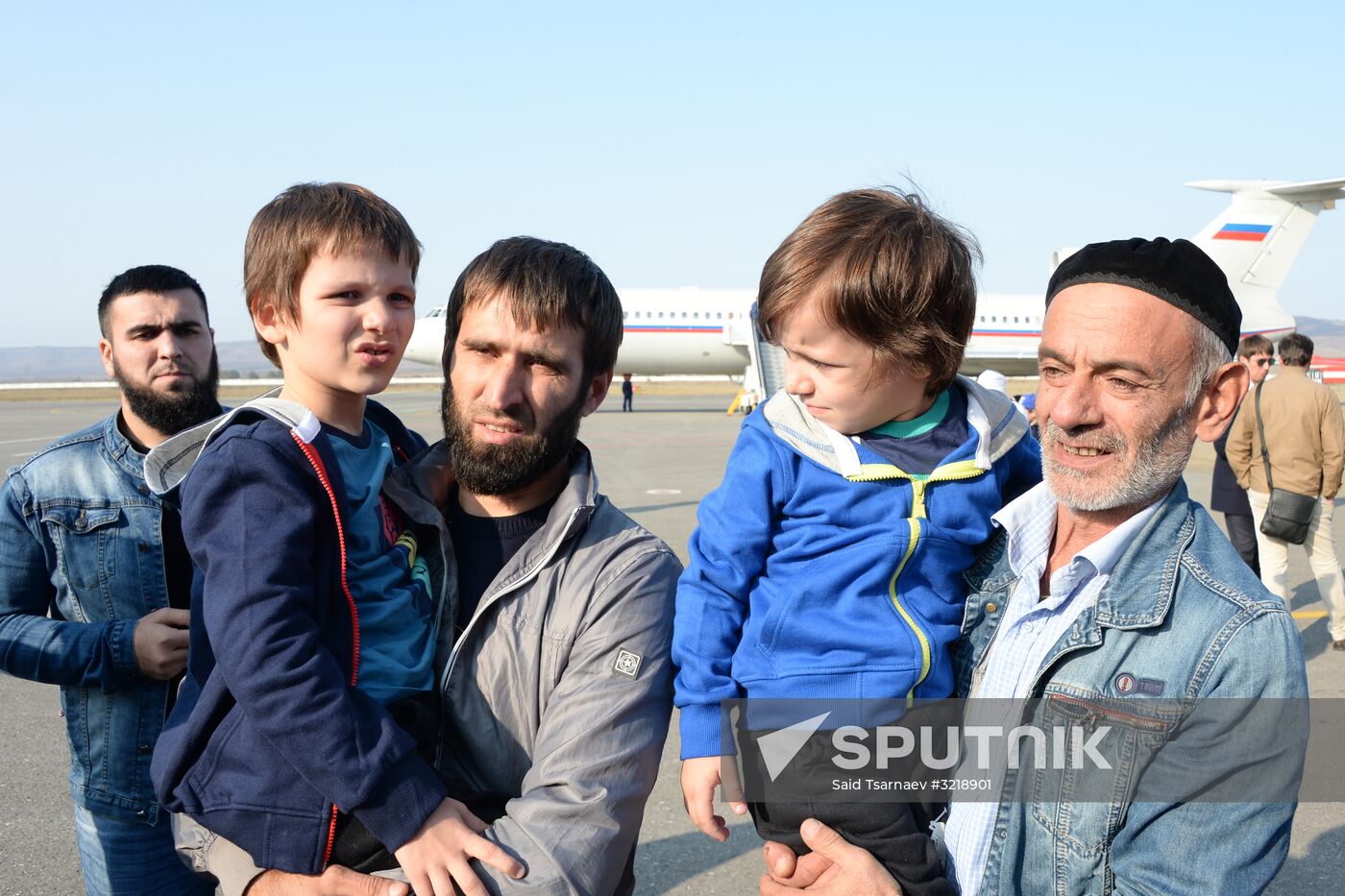 Russian children rescued in Syria are met at Grozny airport